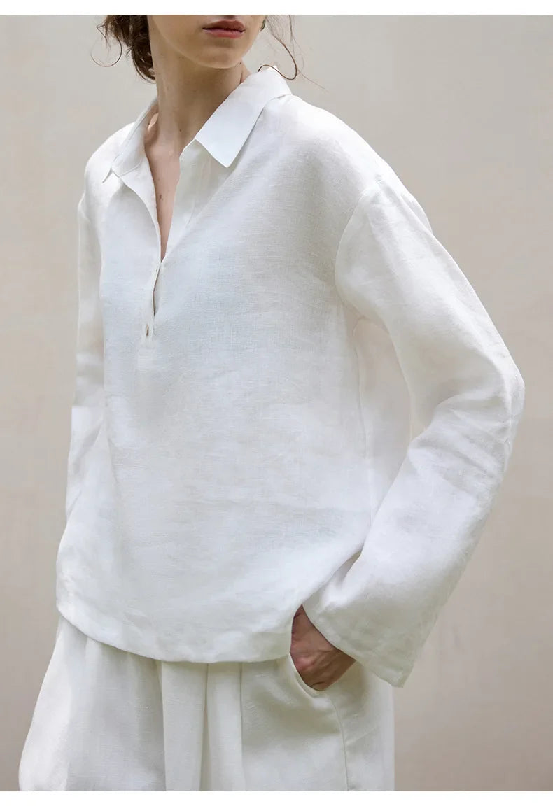 FJØRNA women's linen polo top with collar, lightweight and breathable, shown in a natural fit on a model.