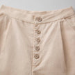 FJØRNA women's knit wide-leg trousers with elastic waistband, soft fabric, and relaxed fit, styled on a model.