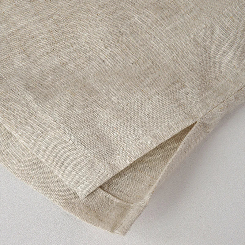 FJØRNA women's linen polo blouse with open collar, lightweight and breathable top for casual or summer wear.