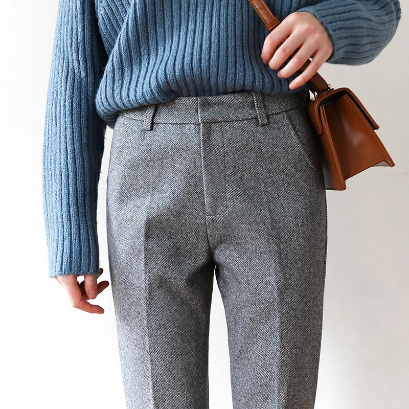 Women’s wool blend trousers by FJØRNA, stylish and comfortable pants with a tailored fit and classic design.
