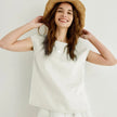 FJØRNA Petal Sleeve Linen T-Shirt featuring soft linen fabric and elegant petal sleeve design, ideal for casual wear.