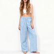 Women’s cotton linen wide-leg trousers with drawstring pull-on design by FJØRNA, featuring a relaxed fit and comfortable style.
