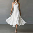 FJØRNA Josie Flowy A-Line Maxi Dress in white, lightweight and elegant women's dress with a flowing silhouette and sleeveless design.