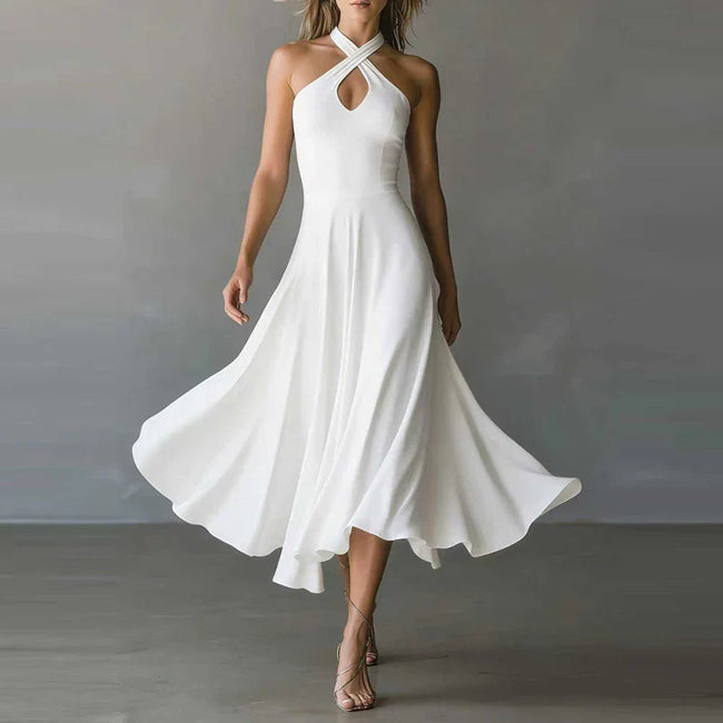 FJØRNA Josie Flowy A-Line Maxi Dress in white, lightweight and elegant women's dress with a flowing silhouette and sleeveless design.