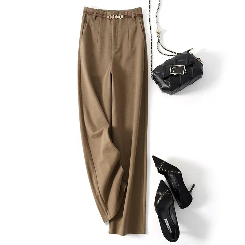 FJØRNA women's wool trousers with wide-leg cut and high waist, featuring a tailored fit and classic design.