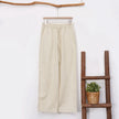 Women’s wide leg cotton linen trousers with drawstring pull-on design by FJØRNA, shown in a relaxed fit style.