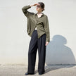 Women’s linen shirt by FJØRNA, lightweight and breathable top featuring a relaxed fit and natural linen fabric.