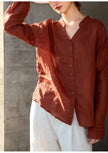 FJØRNA women's linen V-neck shirt, lightweight and breathable top, shown in a natural relaxed fit with long sleeves.