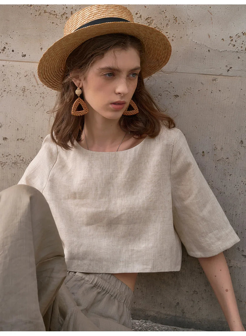 FJØRNA women's linen crop top with short sleeves, lightweight and breathable for casual summer wear.