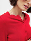 FJØRNA women's knit cardigan, soft and cozy long sleeve top with button-front, in neutral beige color.