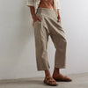 Women’s wide leg denim jeans by FJØRNA, showing relaxed fit and classic blue denim fabric with front pockets.