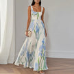 FJØRNA elegant floral maxi dress for women with A-line silhouette, lightweight fabric, and stylish design.