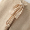 FJØRNA women's joggers pants, featuring a relaxed fit with elastic waistband and tapered leg, suitable for casual wear.