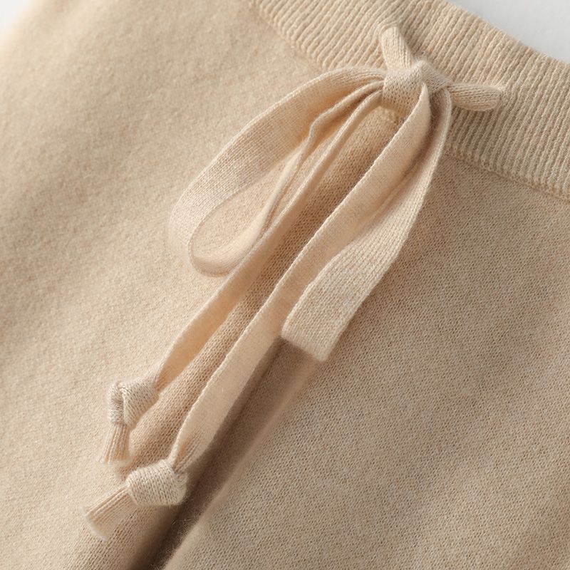 FJØRNA women's joggers pants, featuring a relaxed fit with elastic waistband and tapered leg, suitable for casual wear.