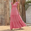 FJØRNA Tiffany tiered ruffle white maxi dress with flowing fabric and layered design, perfect for elegant summer occasions.