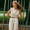 FJØRNA linen crop top for women, lightweight and breathable, featuring a stylish design perfect for warm weather.