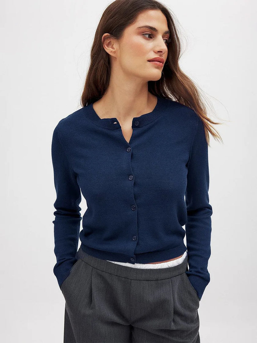 FJØRNA women's knit cardigan, cozy long-sleeve top in soft fabric, featuring a button-up front and classic fit.
