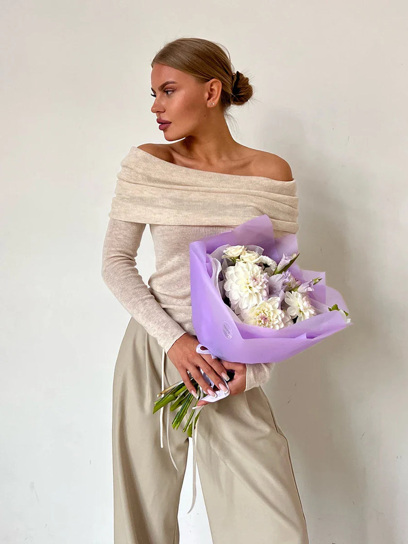 FJØRNA women's ribbed knit off-shoulder top with long sleeves, fitted style, in soft knit fabric.