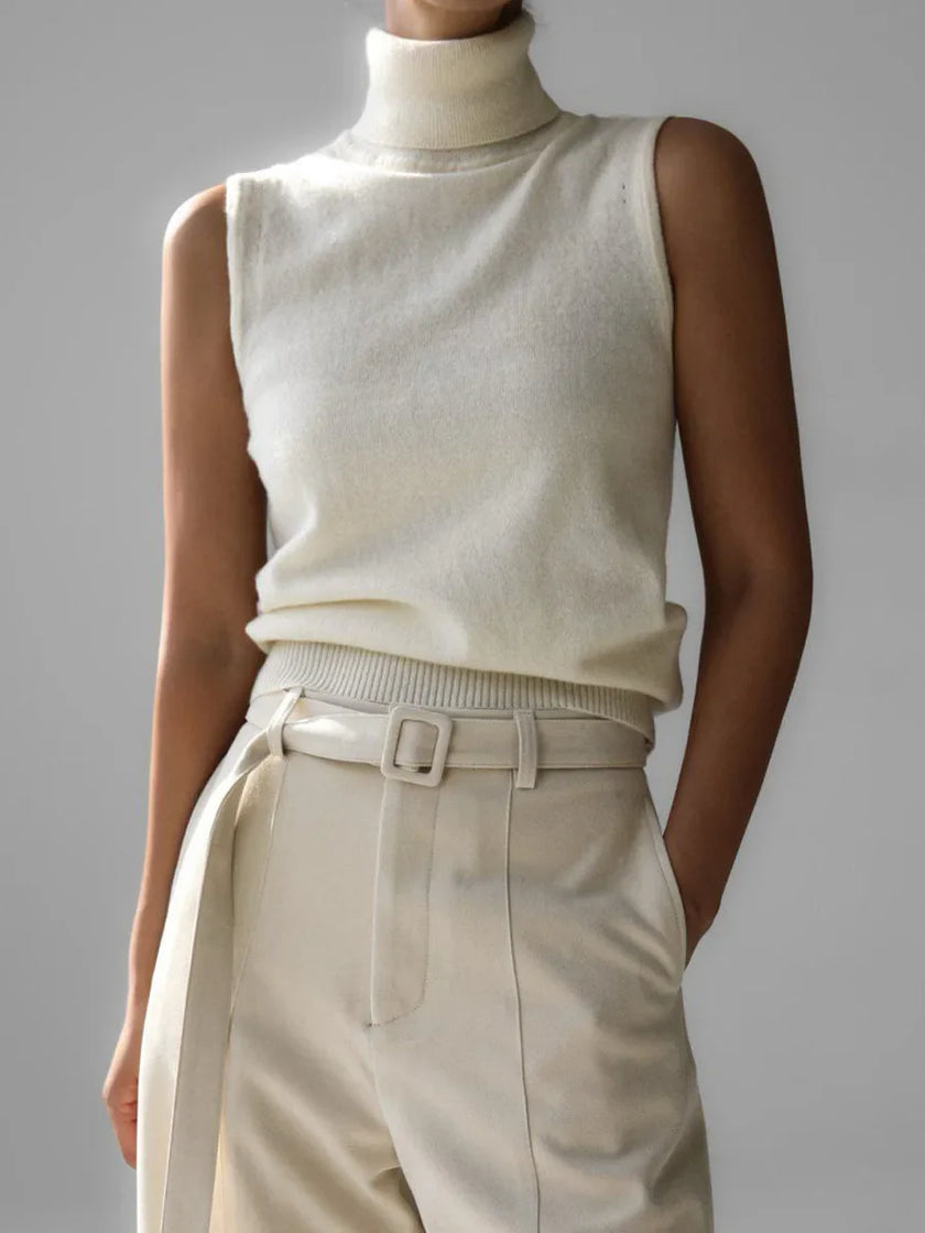 FJØRNA women's sleeveless wool vest, stylish tops with a cozy, textured fabric, ideal for layered winter or fall outfits.