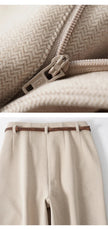 FJØRNA women's wool wide-leg high-waist trousers, stylish and comfortable pants with a tailored fit, shown in dark neutral color.