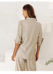Extra-large linen shirt by FJØRNA featuring spacious pockets and a relaxed fit, shown in natural linen fabric.