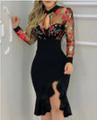 FJØRNA mesh ruffle dress with embroidered sequins, stylish sequin dress perfect for special occasions, shown on a model.