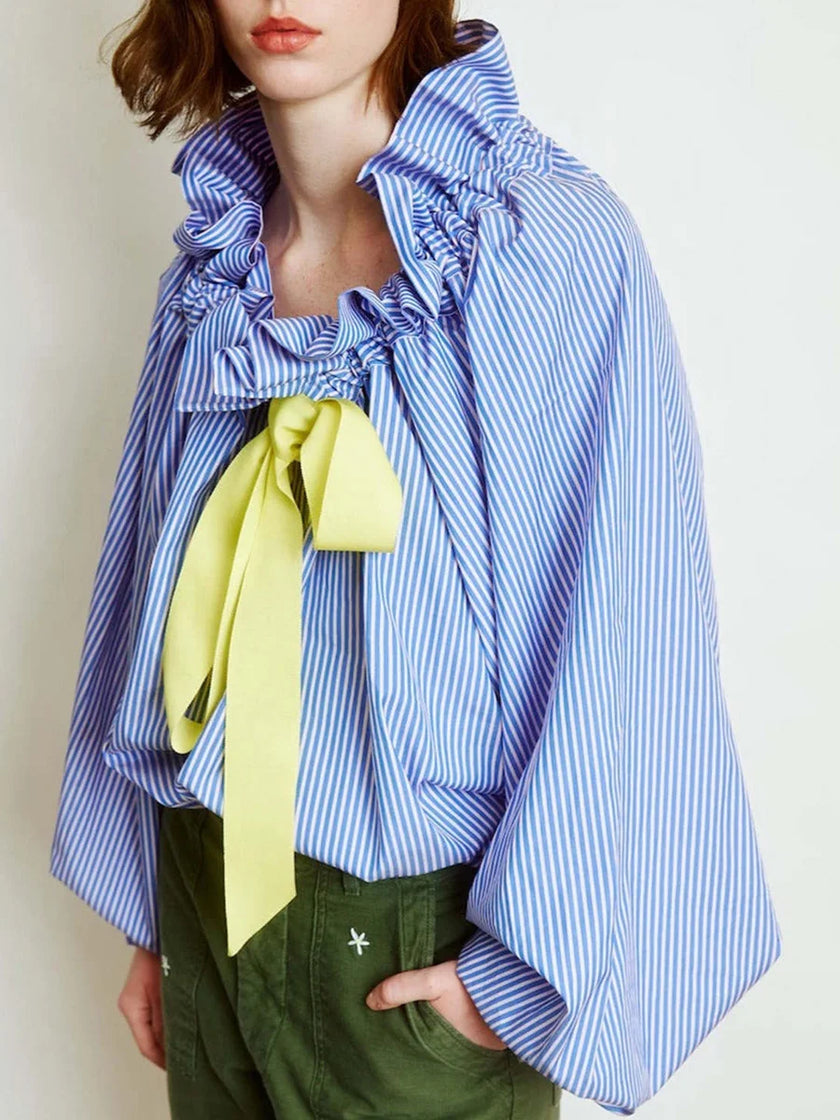 FJØRNA women's cotton blouse with ruffle detail, featuring a lightweight, stylish top perfect for casual or dressy outfits.