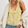 FJØRNA women's lace cami top with trim, featuring delicate lace fabric and feminine design, ideal for layering or casual wear.