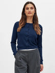 FJØRNA women's knit cardigan, cozy long-sleeve top in soft yarn, featuring a classic button-up design and ribbed cuffs.