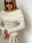 Women’s ribbed knit off-shoulder top by FJØRNA, showcasing a fitted, textured design with long sleeves and a stylish neckline.