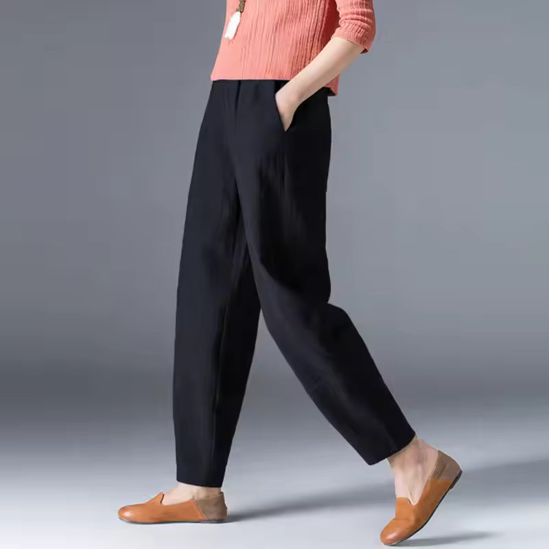 FJØRNA Desiree™ lightweight summer trousers in soft fabric, shown in a relaxed fit with side pockets and a casual style.