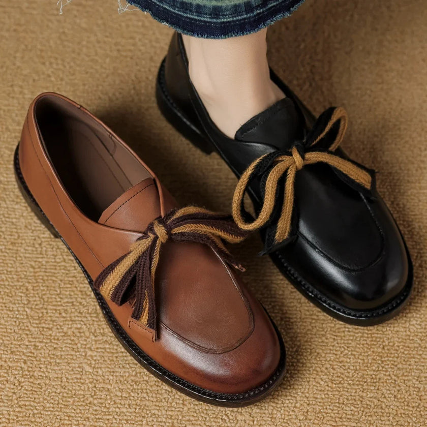 FJØRNA women's handcrafted leather loafers with cushioned insoles, stylish slip-on shoes for women, in black leather.