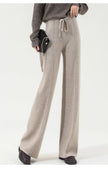 Women’s Merino wool wide leg trousers by FJØRNA with high waist, stylish and comfortable for versatile wear.