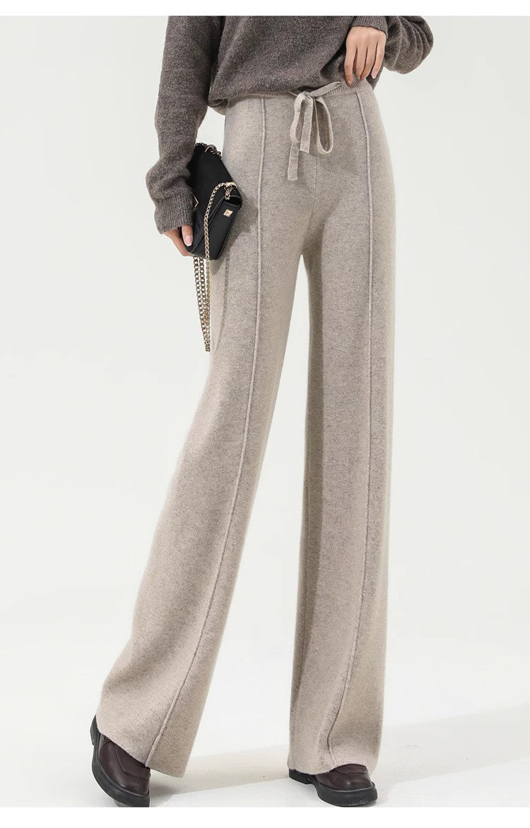 Women’s Merino wool wide leg trousers by FJØRNA with high waist, stylish and comfortable for versatile wear.
