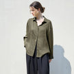 Light beige FJØRNA linen shirt for women, stylish top with a relaxed fit, short sleeves, and natural fabric texture.