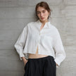 FJØRNA linen crop top for women with pleated long sleeves, stylish and lightweight for casual or summer wear.