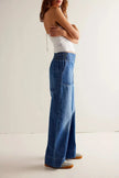 FJØRNA women's wide-leg denim jeans displayed, showcasing classic blue denim and relaxed fit pants for women.