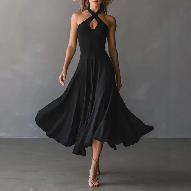 FJØRNA Josie Flowy A-Line Maxi Dress in white, lightweight and elegant, with a fitted bodice and flowing skirt, perfect for summer.