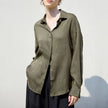 FJØRNA women's linen shirt, lightweight and breathable, shown in a relaxed fit with long sleeves and classic collar.