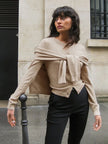 FJØRNA women's knit cardigan, soft and cozy top, featuring a classic design with long sleeves and button closure.