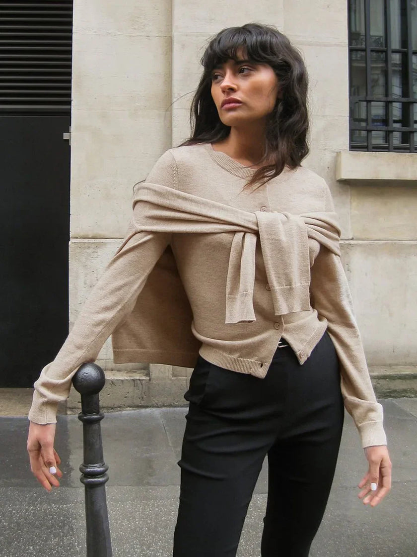 FJØRNA women's knit cardigan, soft and cozy top, featuring a classic design with long sleeves and button closure.