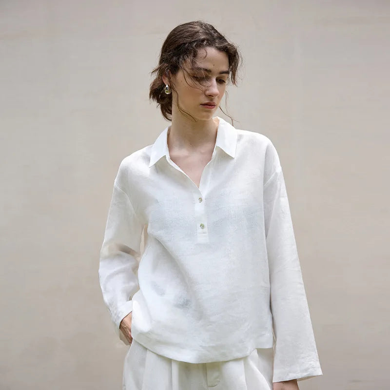FJØRNA women's linen polo top with collar, light and breathable fabric, shown in a stylish women's top with a classic collar design.