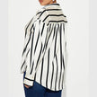 FJØRNA satin blouse for women featuring a sleek, smooth fabric and elegant design, perfect for stylish tops or casual wear.