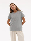 Women's FJØRNA cotton T-shirt, soft and comfortable top with a classic fit, shown in a neutral color.