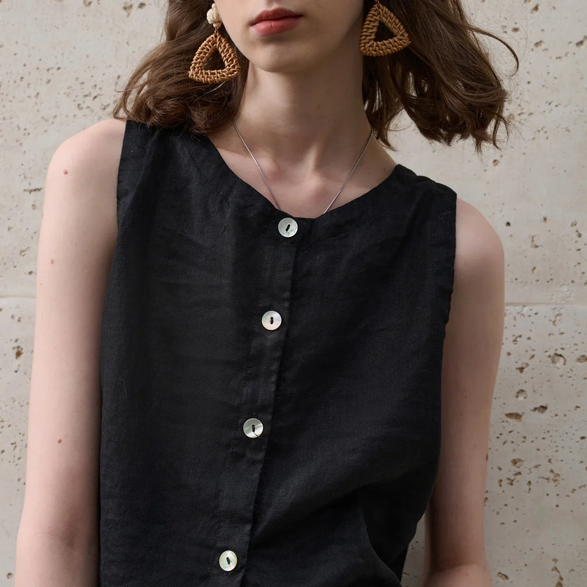 FJØRNA women's linen crop top, sleeveless design, lightweight and breathable for warm weather, casual summer top.