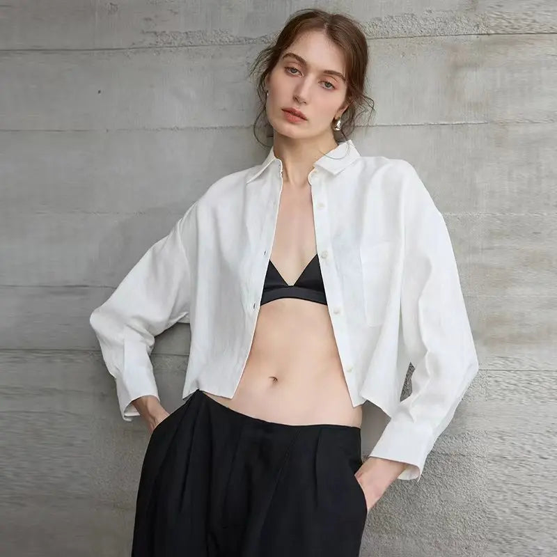 FJØRNA linen crop top for women with pleated long sleeves, stylish and lightweight, perfect for casual or summer outfits.