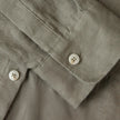 FJØRNA linen crop top for women with pleated long sleeves, stylish and breathable, shown on a model.