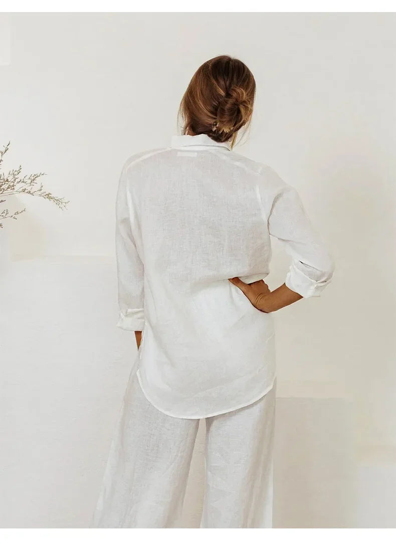 Extra-large linen shirt with spacious pockets by FJØRNA, featuring a relaxed fit and natural fabric texture.