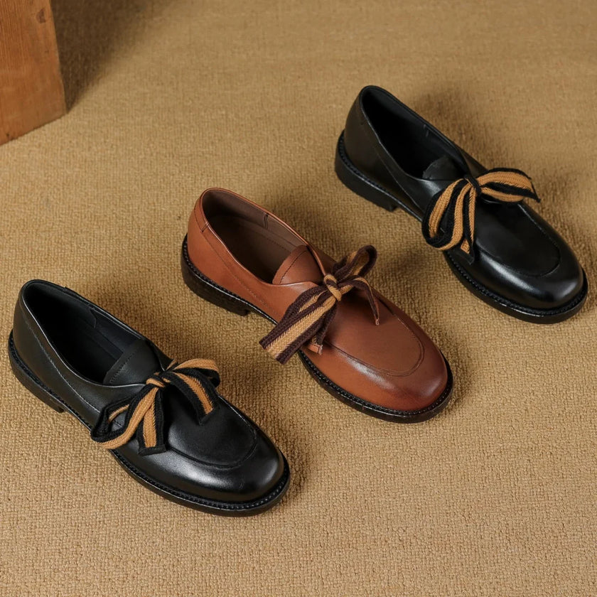 Women's handcrafted leather loafers with cushioned insoles by FJØRNA, featuring a stylish slip-on design and smooth leather finish.
