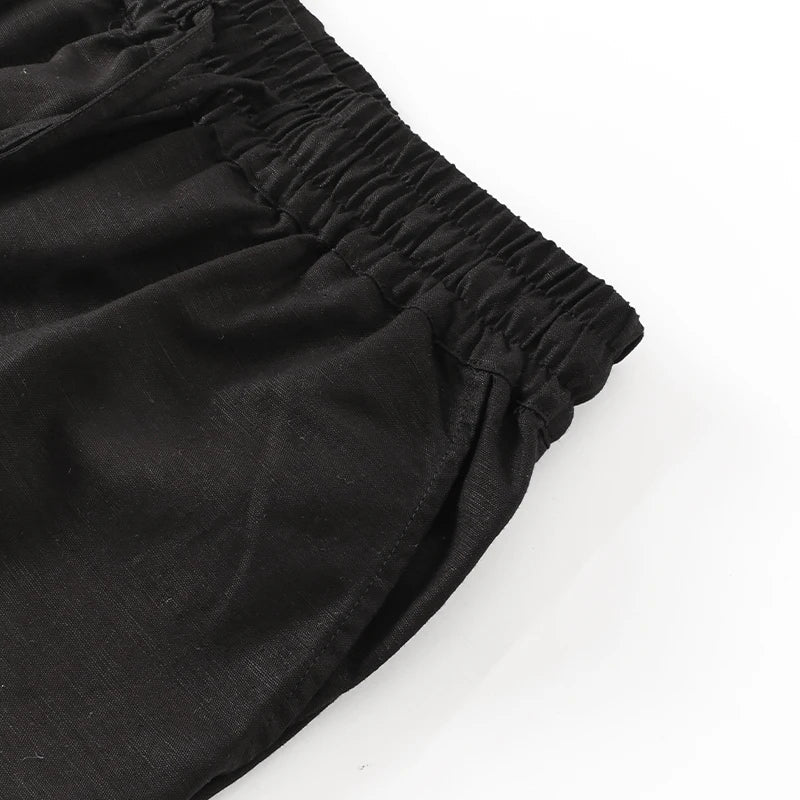 FJØRNA women’s cotton linen wide leg trousers with drawstring pull-on design, relaxed fit and casual style.